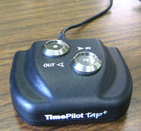 TimePilot Tap+ used as a desk timeclock.
